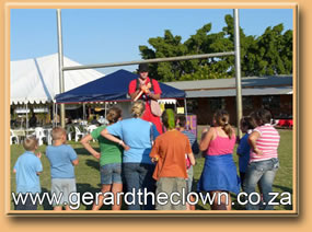 RD doing stilts and balloons